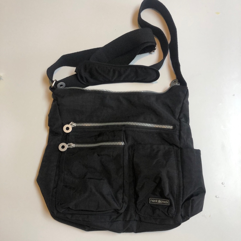 neat pack Tote bag with silver decorative zippers shoulder strap